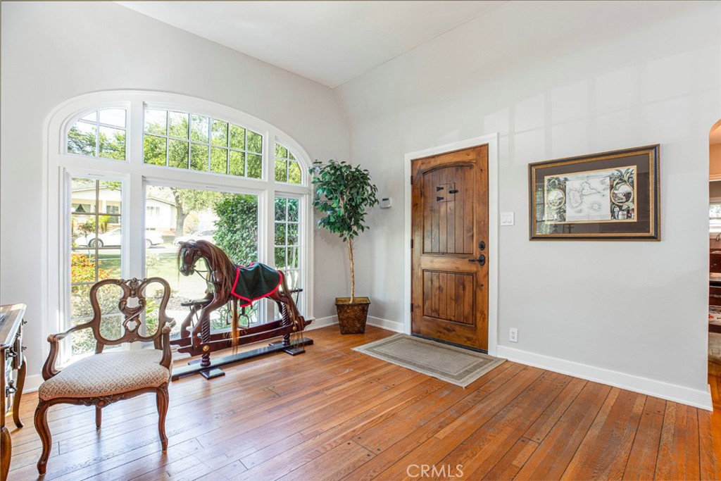 1748 Bel Aire Drive Glendale, CA 91201 - Photo 7 of 51 a living room with furniture and a large window
