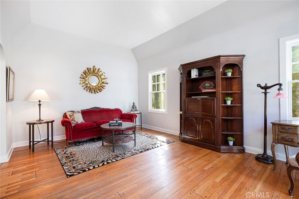 1748 Bel Aire Drive Glendale, CA 91201 - Photo 8 of 51 a living room with furniture and wooden floor