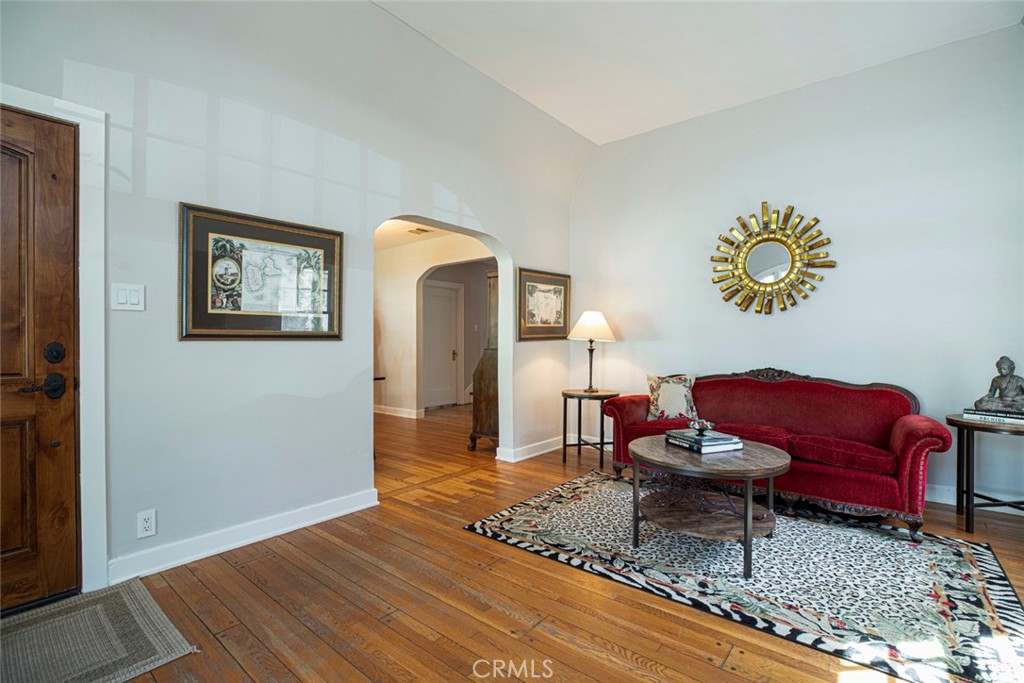 1748 Bel Aire Drive Glendale, CA 91201 - Photo 9 of 51 a living room with furniture and a rug