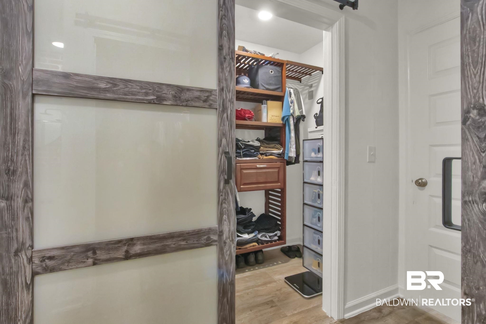 23810 Unbridled Loop Daphne, AL 36526 - Photo 22 of 50 Spacious closet with hardwood / wood-style floors