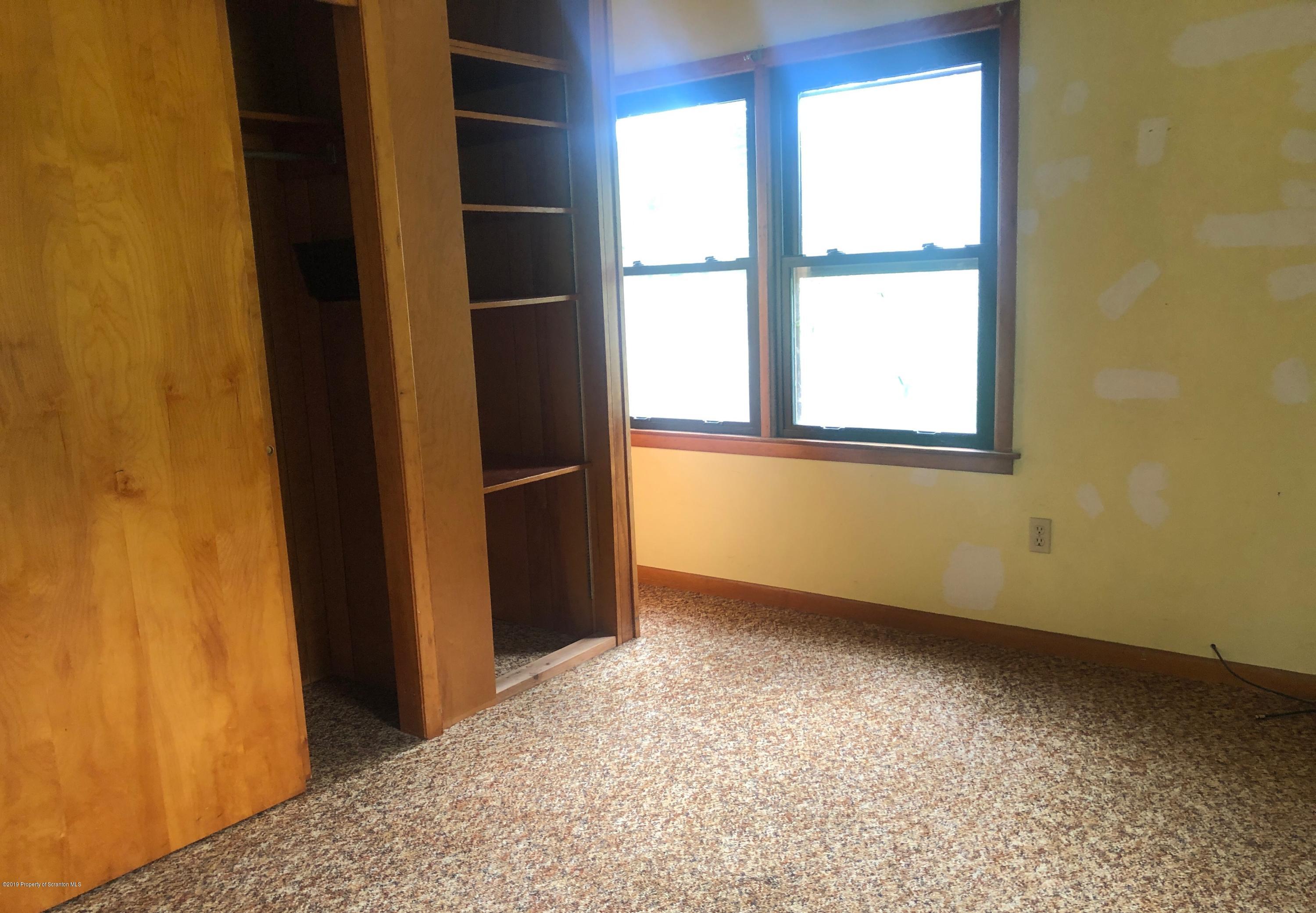 621 Randolph Road Great Bend, PA 18821 - Photo 3 of 11 an empty room with a window
