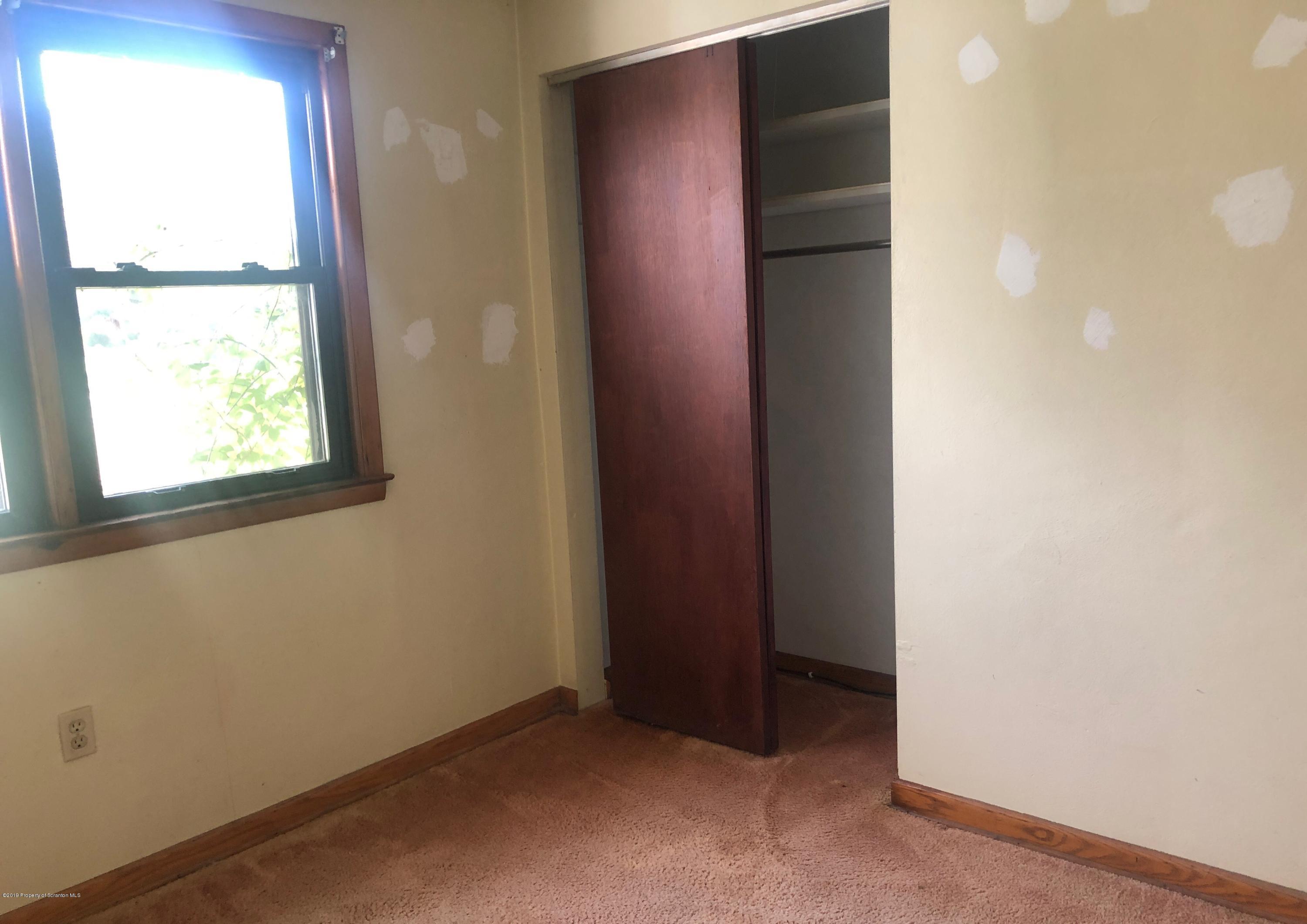 621 Randolph Road Great Bend, PA 18821 - Photo 5 of 11 an empty room with a window
