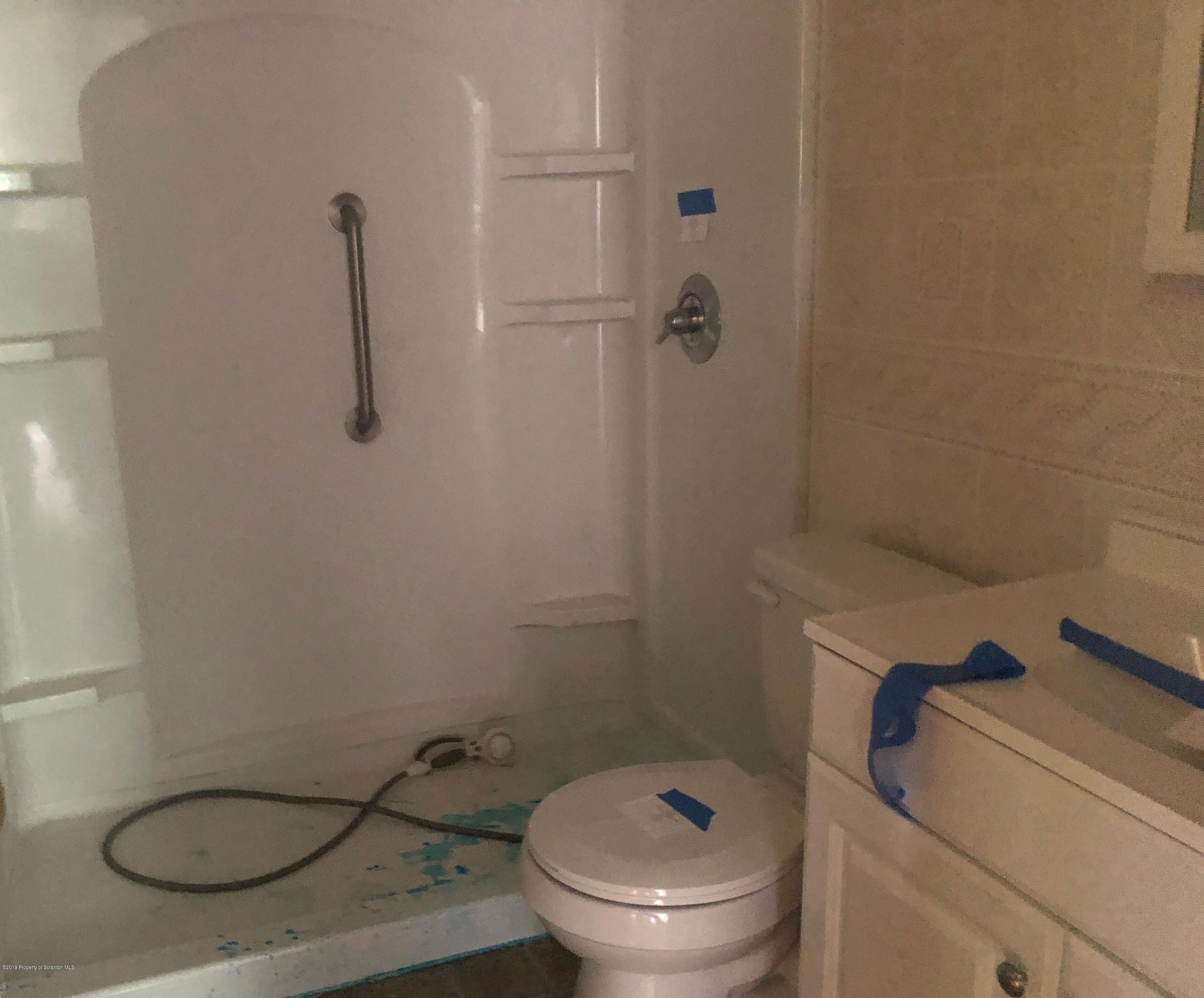 621 Randolph Road Great Bend, PA 18821 - Photo 9 of 11 a bathroom with a toilet and a shower