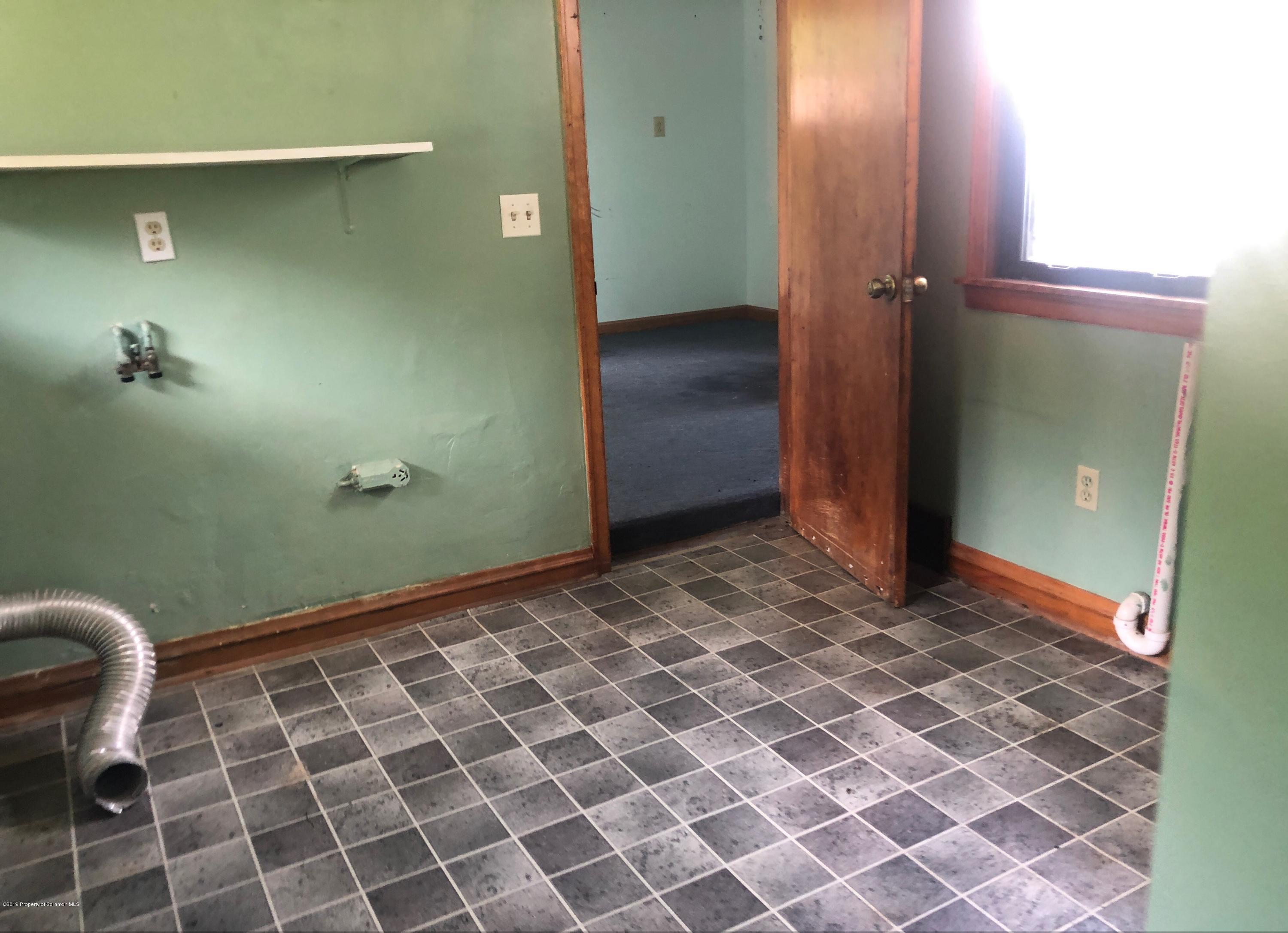 621 Randolph Road Great Bend, PA 18821 - Photo 10 of 11 a view of a bathroom with a glass door shower