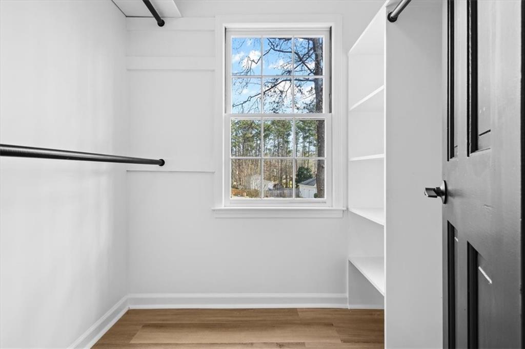 7605 Raleigh Lane Jonesboro, GA 30236 - Photo 31 of 40 a view of small space with racks on the wall