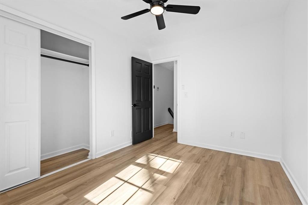 7605 Raleigh Lane Jonesboro, GA 30236 - Photo 34 of 40 a view of empty room with wooden floor