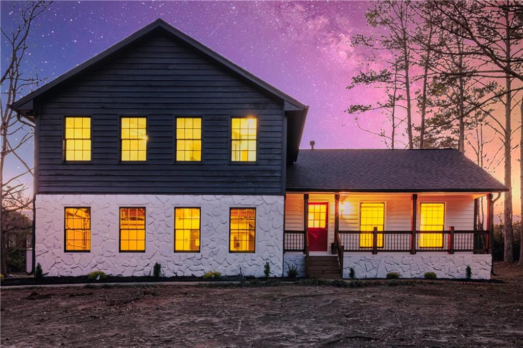 7605 Raleigh Lane Jonesboro, GA 30236 - Photo 40 of 40 a front view of a house with a yard
