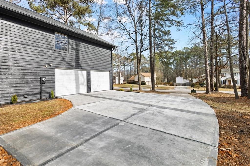 7605 Raleigh Lane Jonesboro, GA 30236 - Photo 5 of 40 a view of outdoor space yard and basketball court
