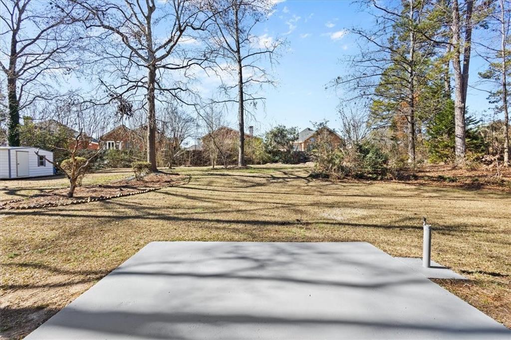 7605 Raleigh Lane Jonesboro, GA 30236 - Photo 10 of 40 a view of road with large trees