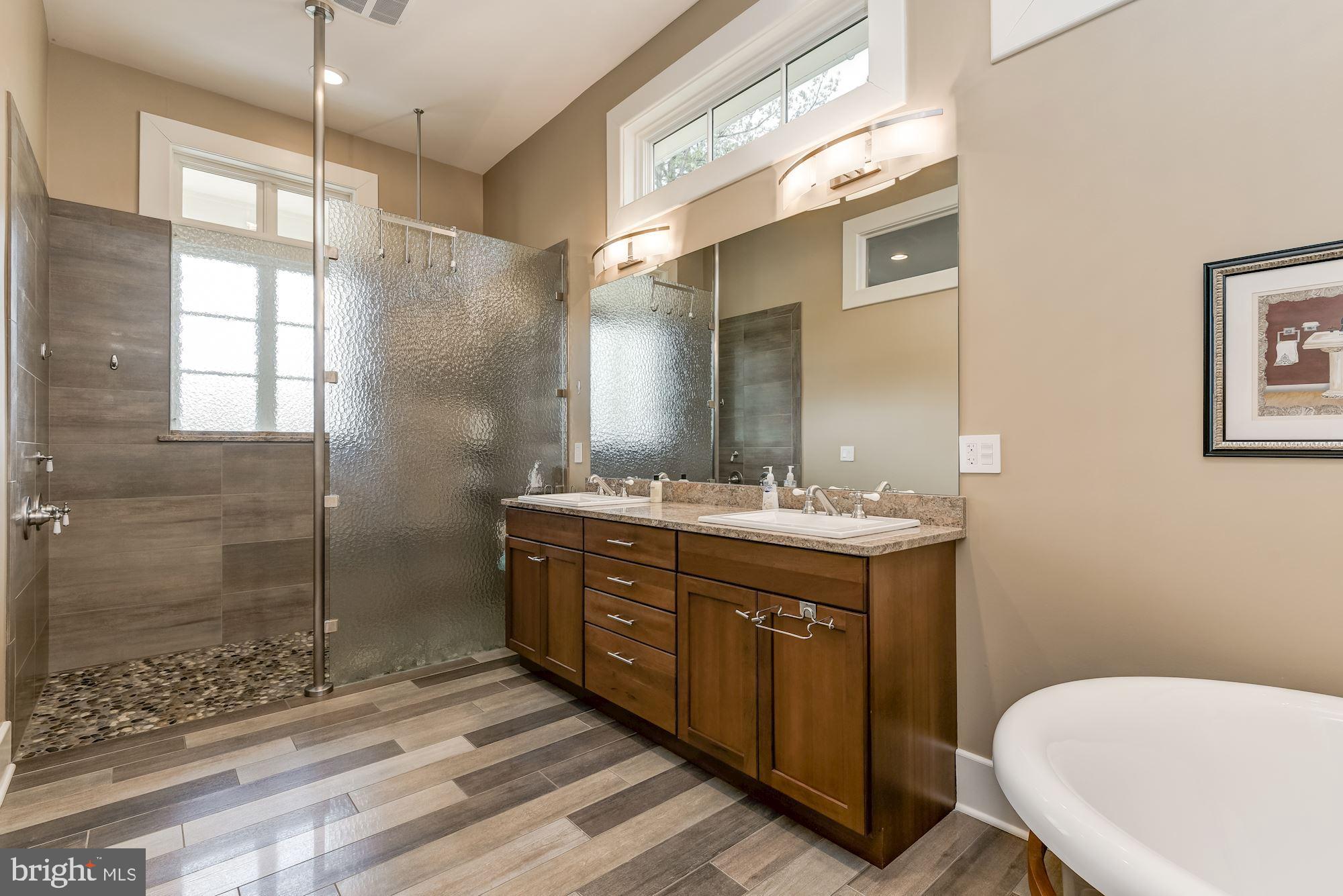 11031 Gaither Farm Road Ellicott City, MD 21042 - Photo 28 of 63 Main Level Primary Bedroom En Suite Bath