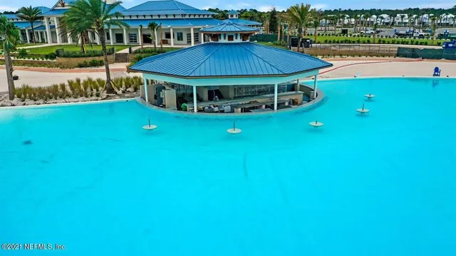 a view of a swimming pool and an outdoor space