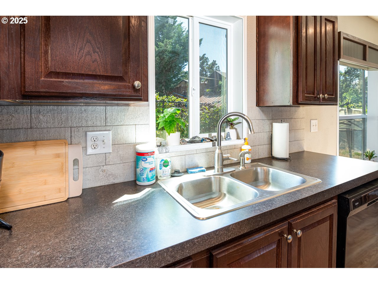 466 South 71st Street Springfield, OR 97478 - Photo 13 of 33 a kitchen with a sink cabinets and a window