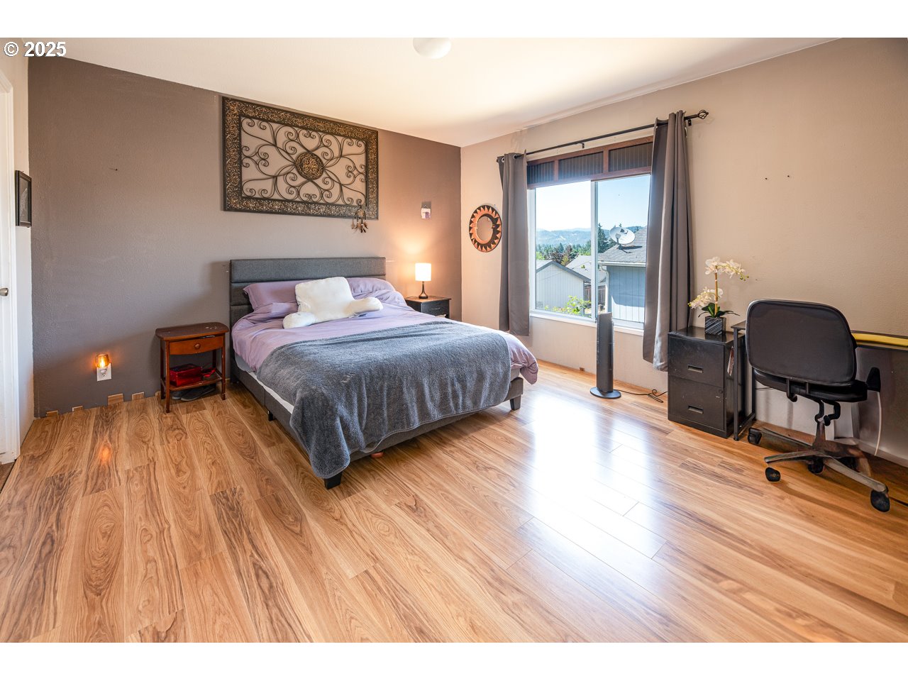 466 South 71st Street Springfield, OR 97478 - Photo 17 of 33 a bedroom with a bed and a chair