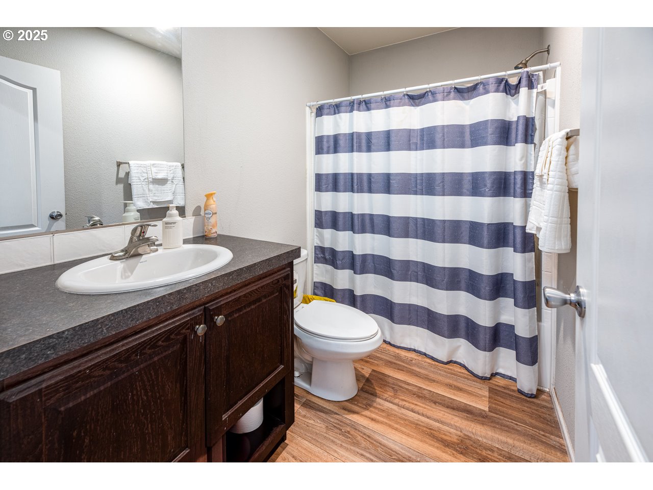 466 South 71st Street Springfield, OR 97478 - Photo 21 of 33 a bathroom with a sink toilet and shower