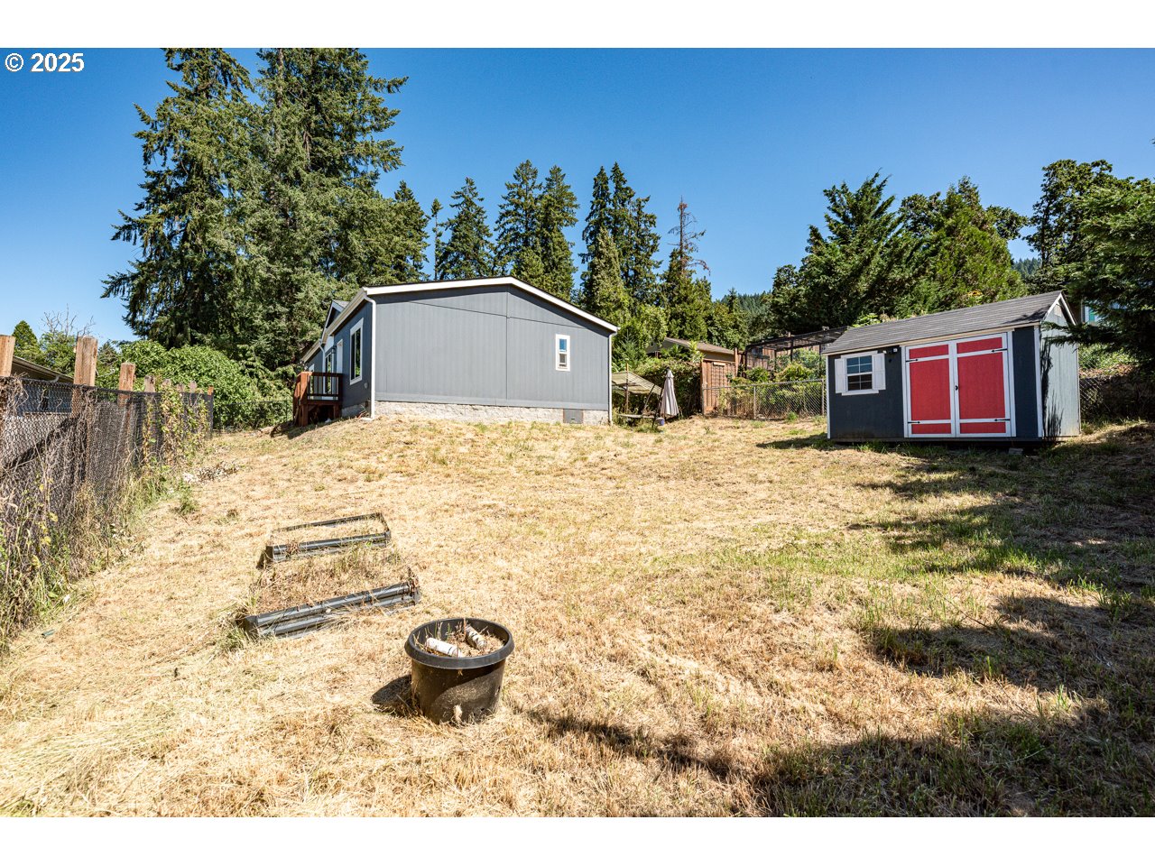 466 South 71st Street Springfield, OR 97478 - Photo 30 of 33 a view of a house with a yard