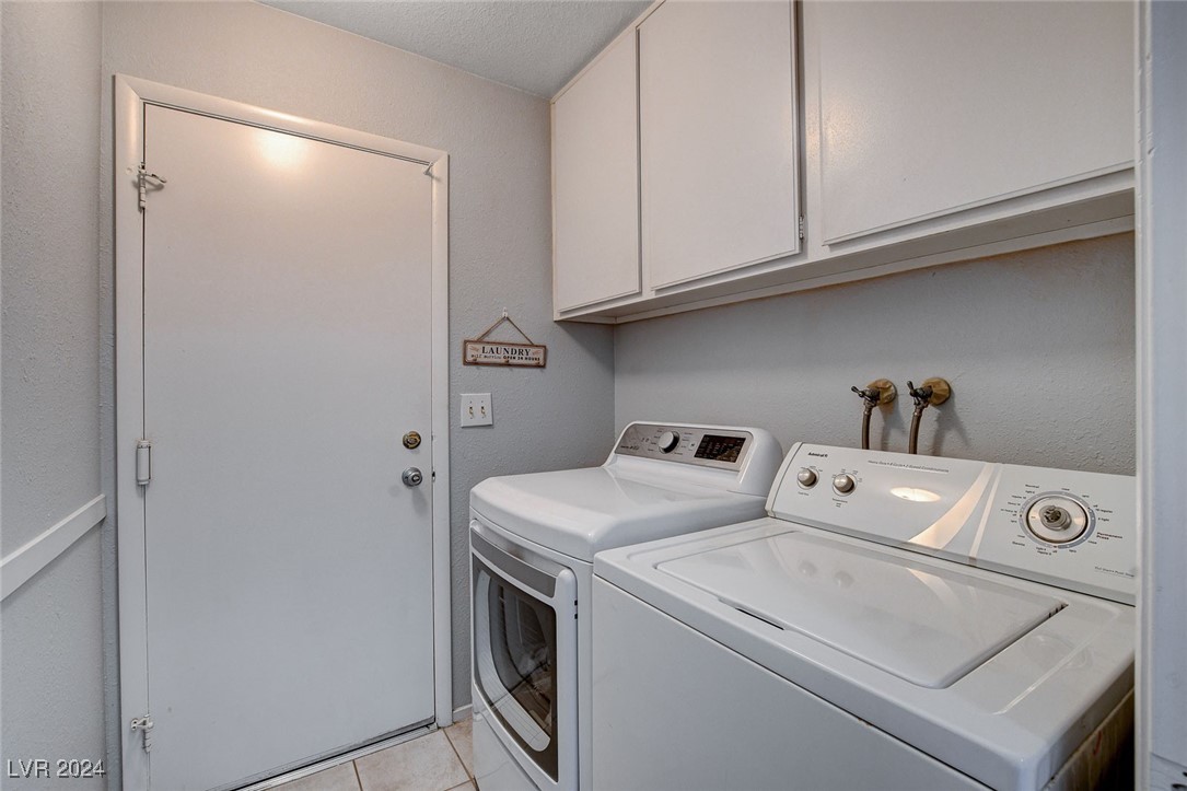 3153 Viewcrest Avenue Henderson, NV 89014 - Photo 43 of 49 Laundry Room off garage with storage cabinets. WASHER & DRYER INCLUDED!