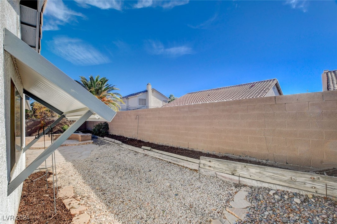 3153 Viewcrest Avenue Henderson, NV 89014 - Photo 49 of 49 Good-sized backyard set up with planter boxes awaiting your creative touch!