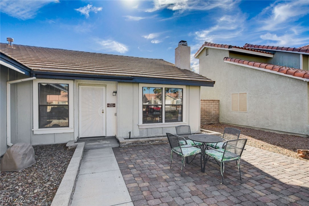 3153 Viewcrest Avenue Henderson, NV 89014 - Photo 5 of 49 Walkway with large patio area as you approach the front door/