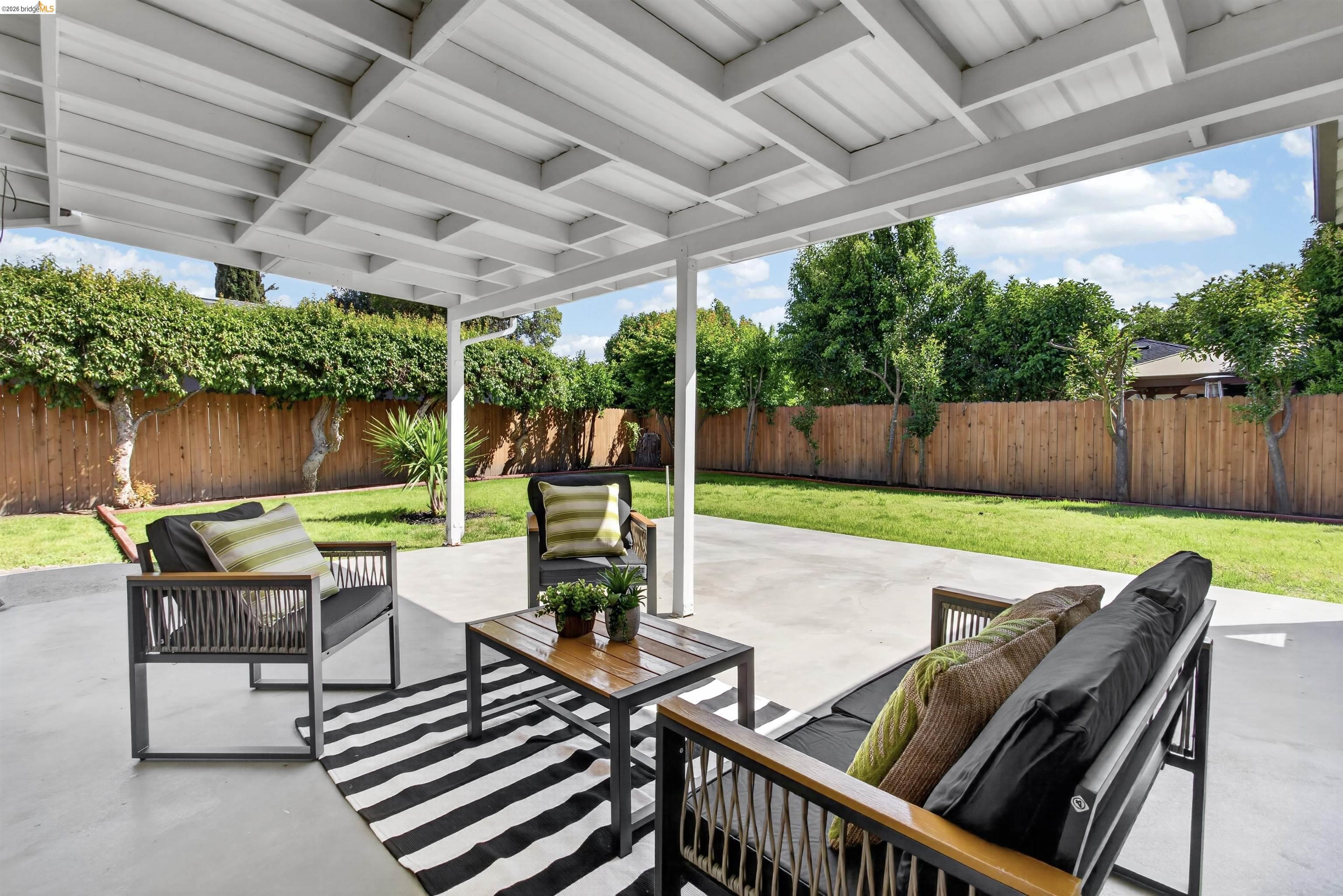 4321 Davis Way Livermore, CA 94550 - Photo 27 of 34 Covered patio featuring a white slatted ceiling and concrete flooring