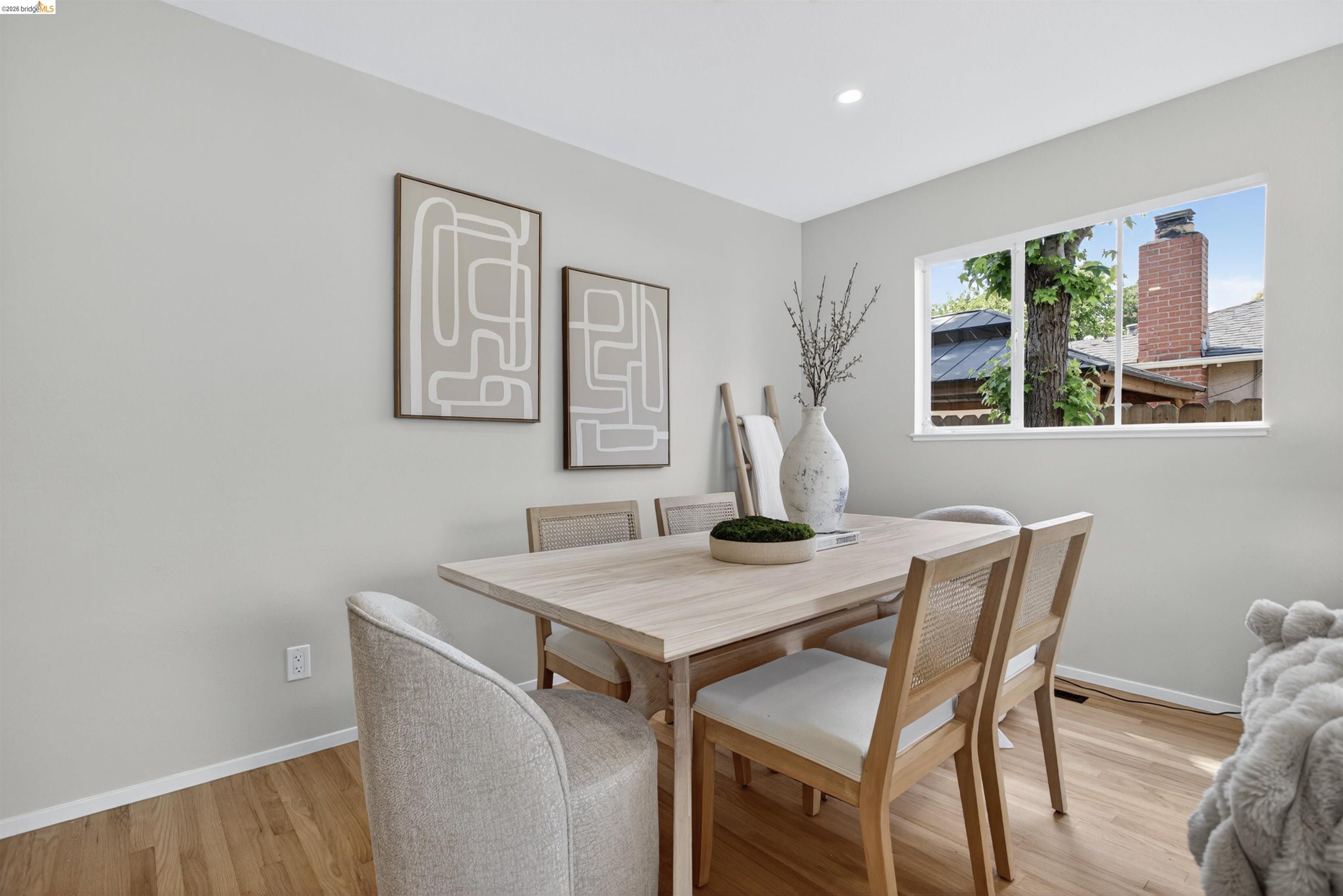 4321 Davis Way Livermore, CA 94550 - Photo 7 of 34 Light-toned wood-finish flooring complements the neutral wall color