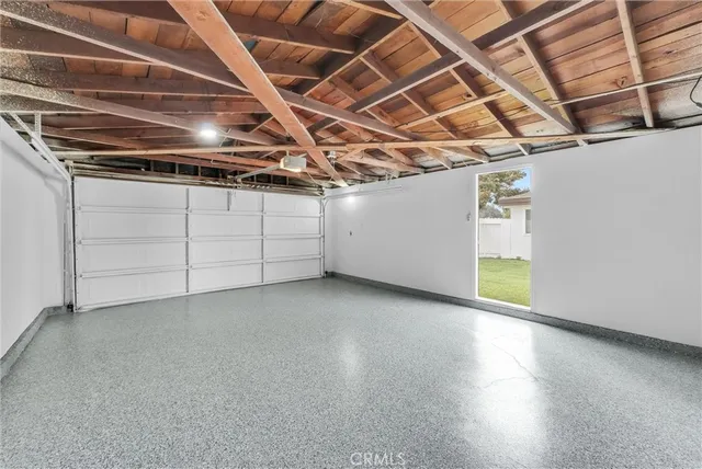 a view of a room with wooden walls