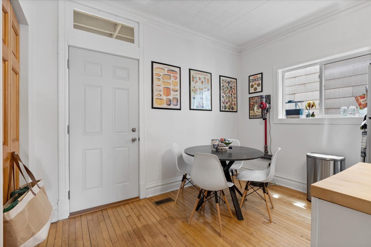 2735 North Ridgeway Avenue Chicago, IL 60647 - Photo 26 of 40 a workspace with furniture and wooden floor