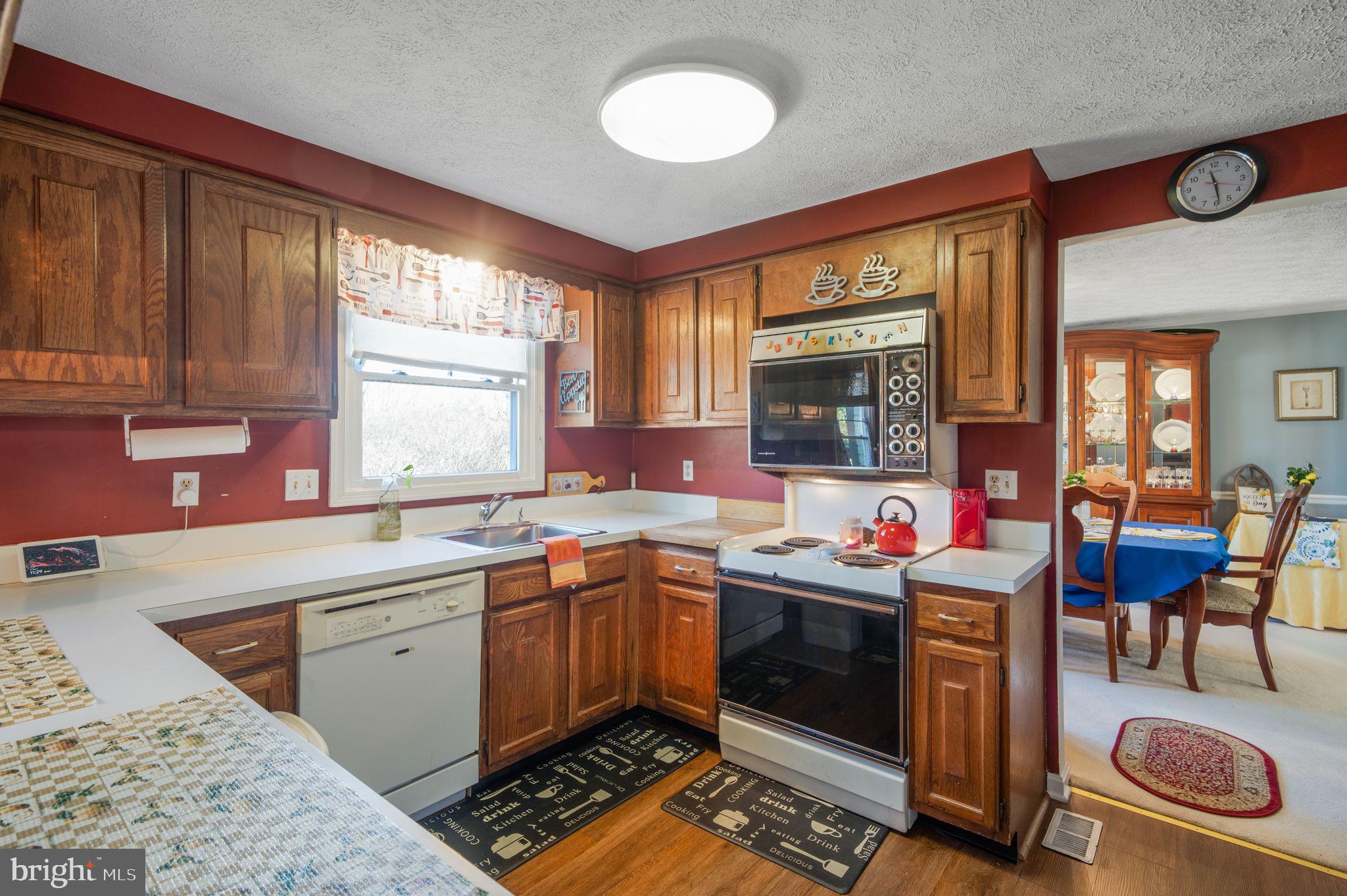 11006 Lake Arbor Way Bowie, MD 20721 - Photo 12 of 46 a kitchen that has a sink and a stove in it