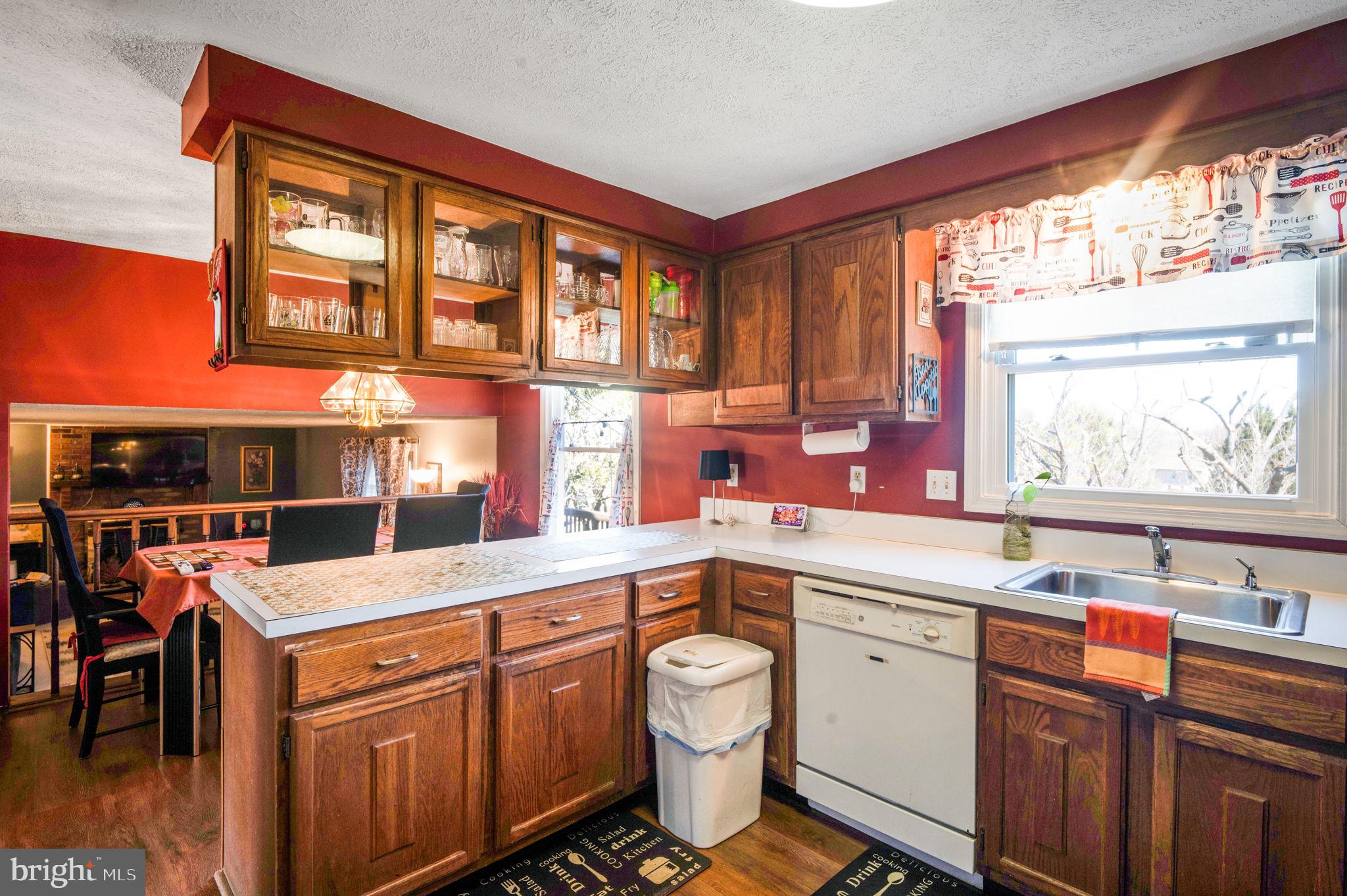 11006 Lake Arbor Way Bowie, MD 20721 - Photo 13 of 46 a kitchen with a sink stove and cabinets