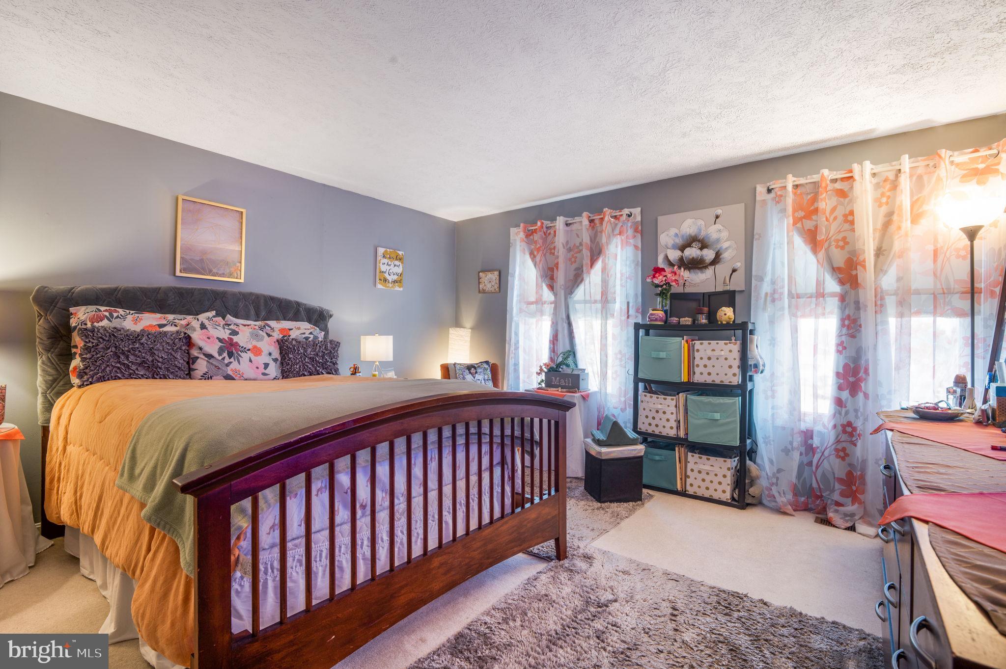 11006 Lake Arbor Way Bowie, MD 20721 - Photo 30 of 46 a bedroom with a bed and a window