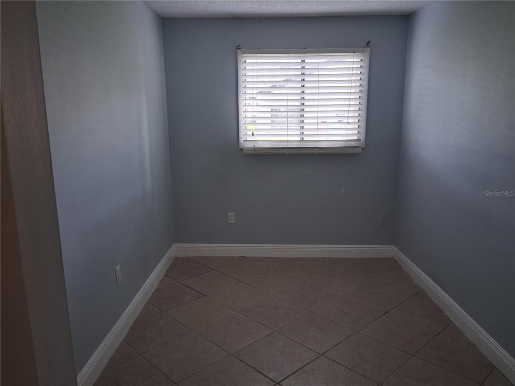 958 Lake Destiny Road, Unit D Altamonte Springs, FL 32714 - Photo 10 of 16 an empty room with a window