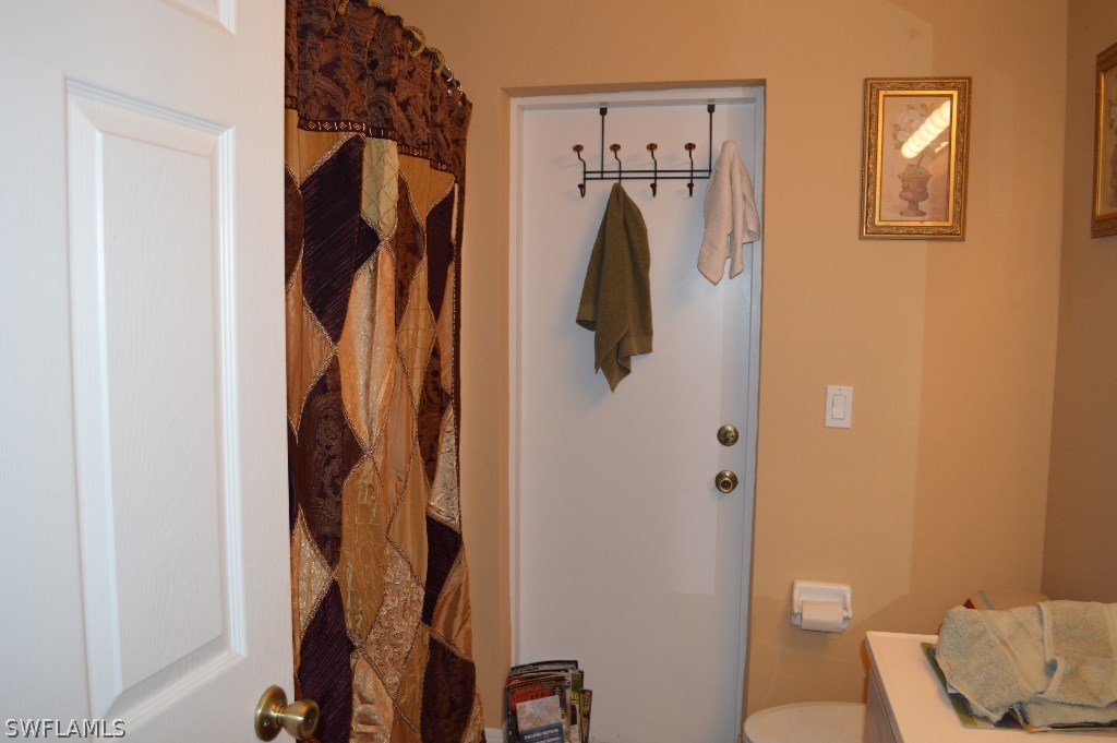 21951 Claytor Road Alva, FL 33920 - Photo 11 of 17 a bathroom with a shower and toilet