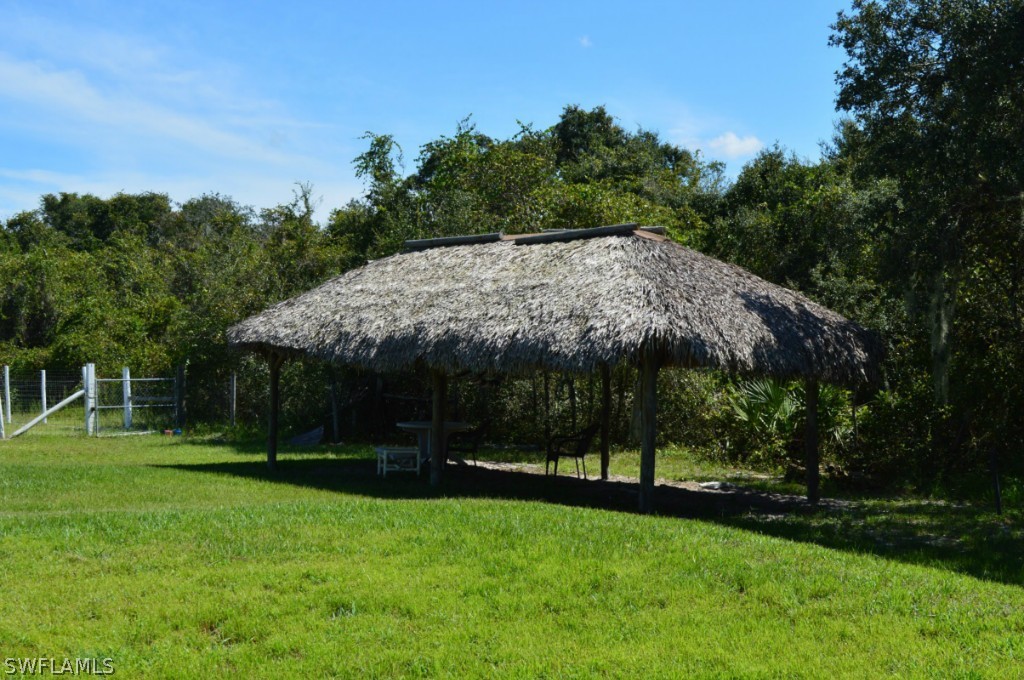 21951 Claytor Road Alva, FL 33920 - Photo 17 of 17 a view of a garden with a slide