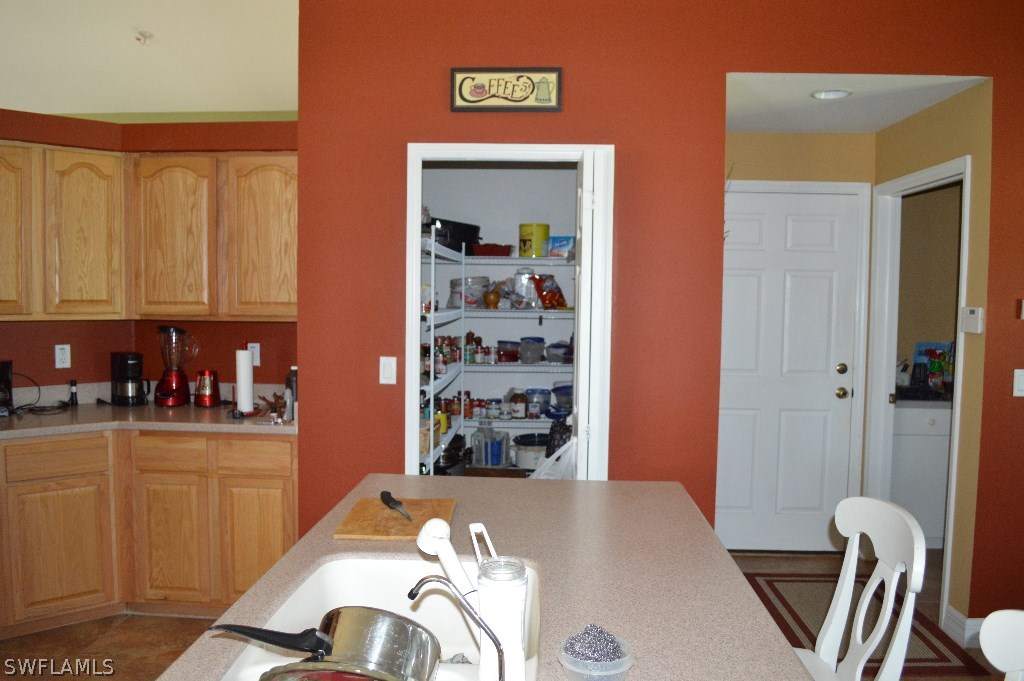 21951 Claytor Road Alva, FL 33920 - Photo 9 of 17 a view of a kitchen and dining room