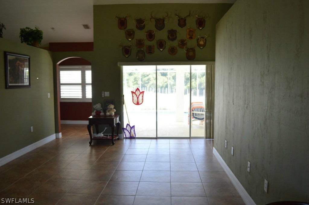 21951 Claytor Road Alva, FL 33920 - Photo 10 of 17 a view of livingroom with furniture and a window