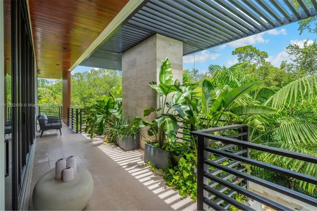 a view of a backyard with plants