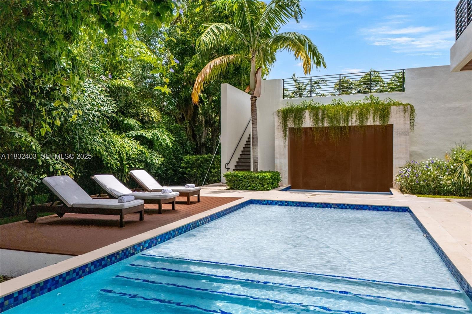 7610 Southwest 48th Court Miami, FL 33143 - Photo 29 of 34 swimming pool view with a seating space