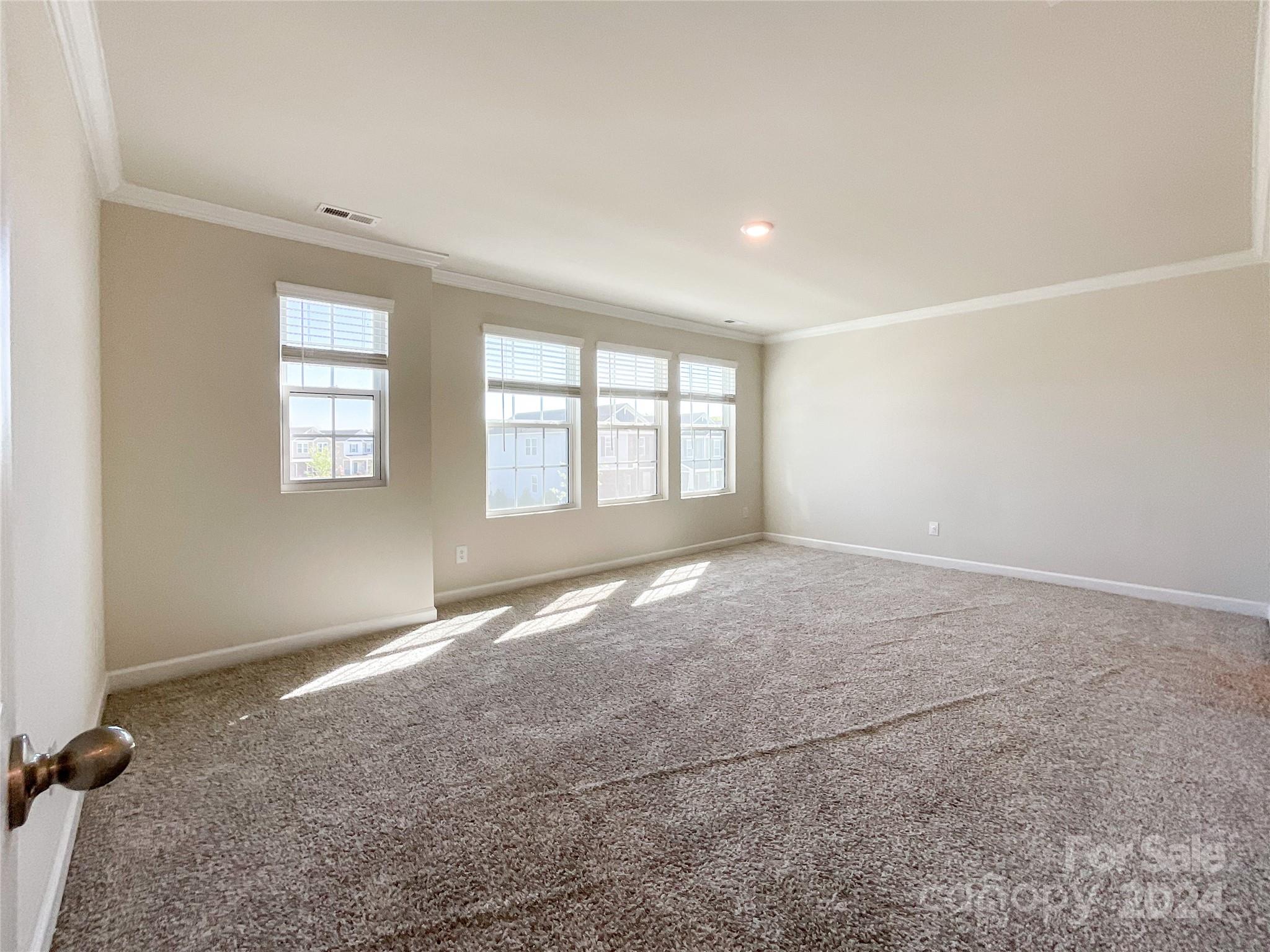 137 Cedar Knoll Circle Pineville, NC 28134 - Photo 21 of 48 an empty room with windows