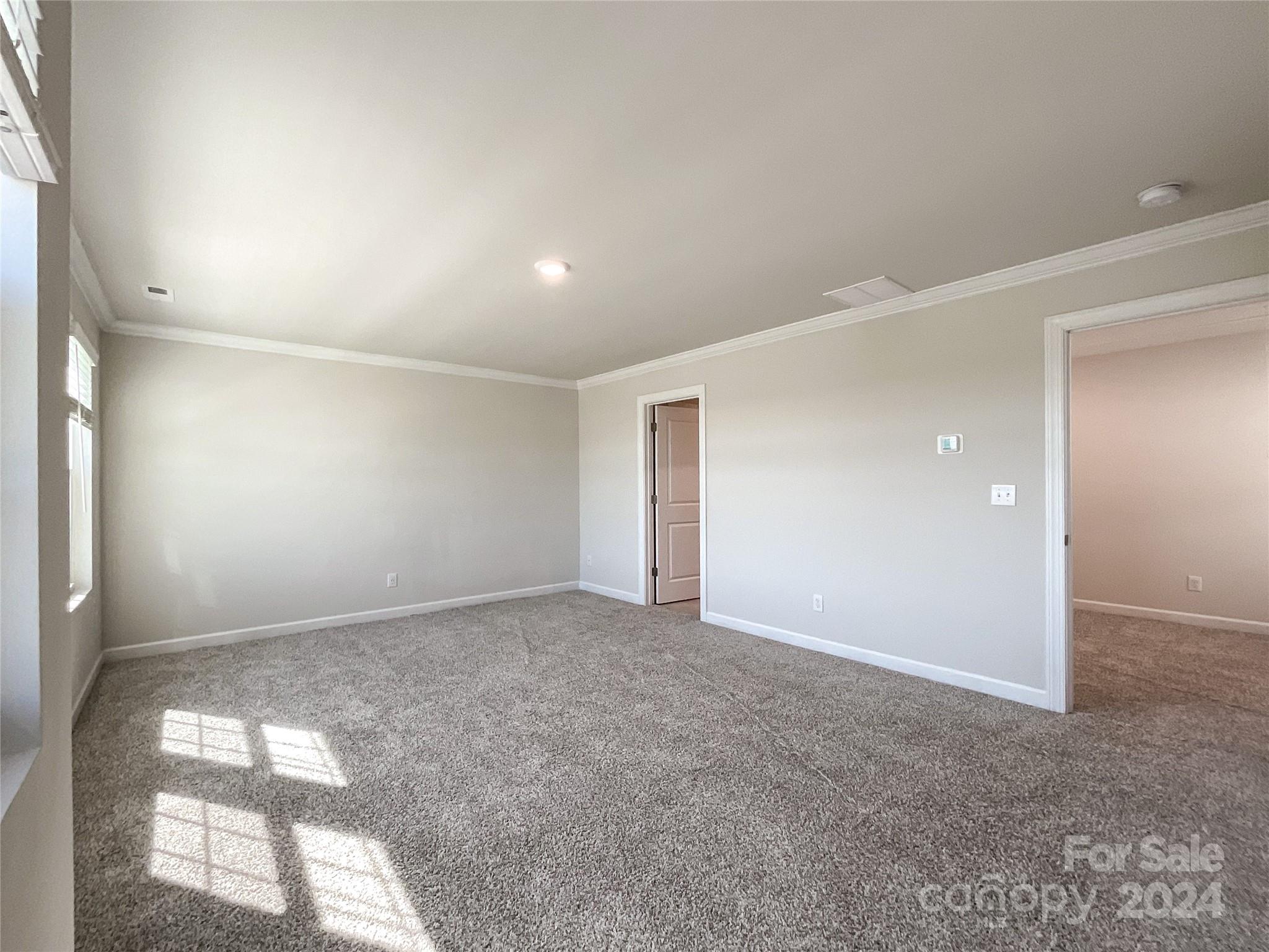 137 Cedar Knoll Circle Pineville, NC 28134 - Photo 22 of 48 an empty room with windows and entrance