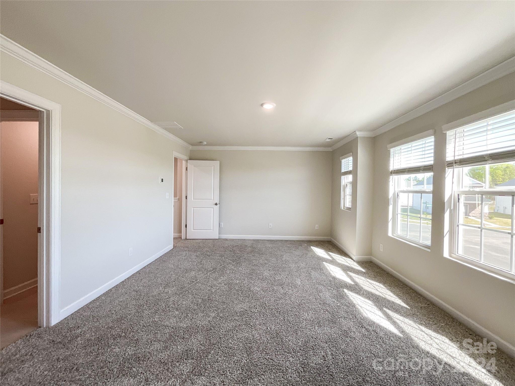 137 Cedar Knoll Circle Pineville, NC 28134 - Photo 24 of 48 an empty room with windows