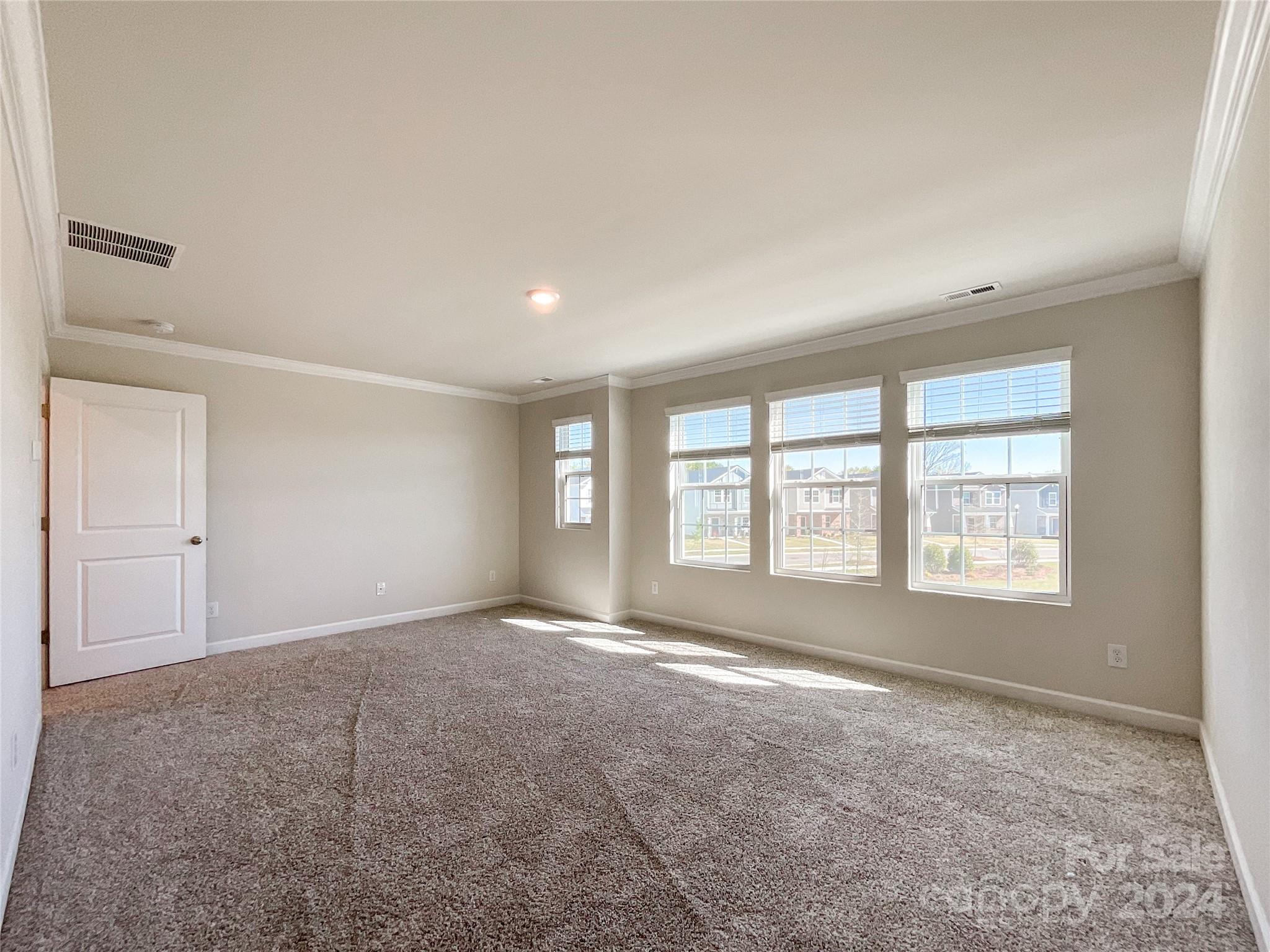 137 Cedar Knoll Circle Pineville, NC 28134 - Photo 25 of 48 a view of an empty room with a window