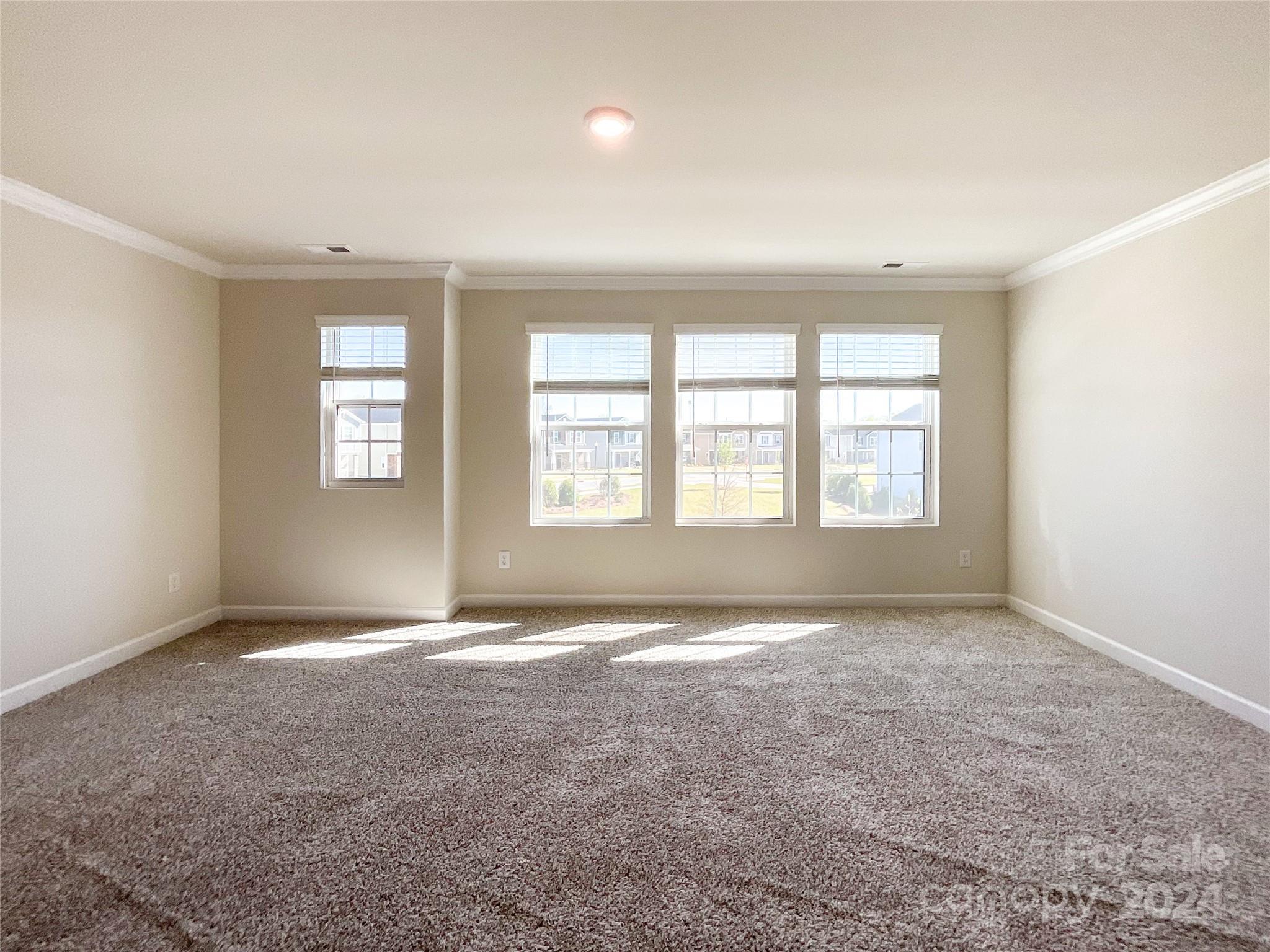 137 Cedar Knoll Circle Pineville, NC 28134 - Photo 26 of 48 an empty room with windows