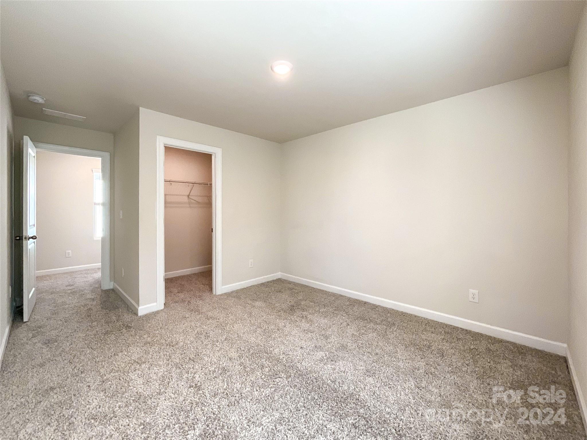 137 Cedar Knoll Circle Pineville, NC 28134 - Photo 37 of 48 an empty room with an entryway