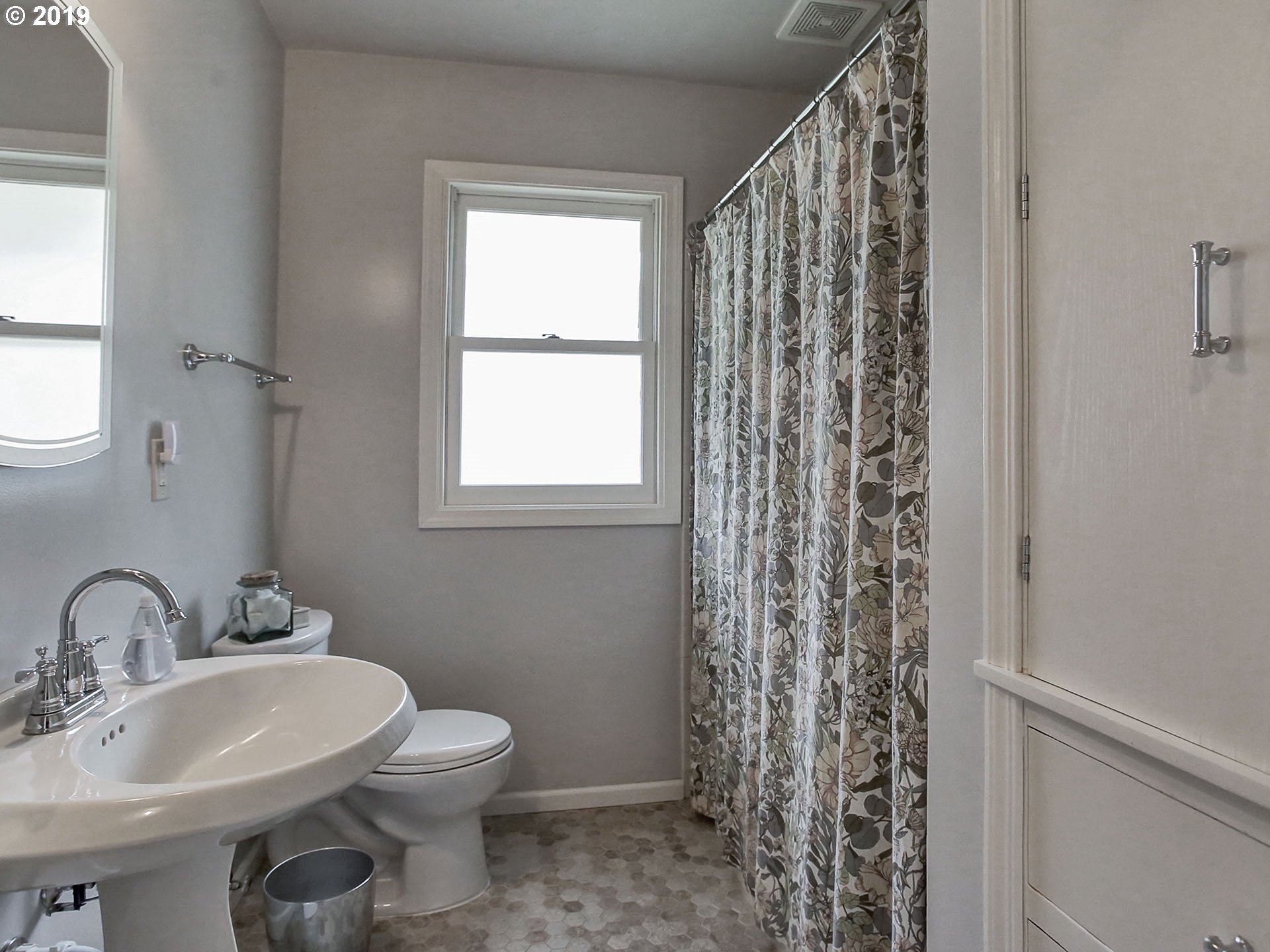 4119 Southwest Hamilton Street Portland, OR 97221 - Photo 14 of 29 a bathroom with a sink toilet and shower