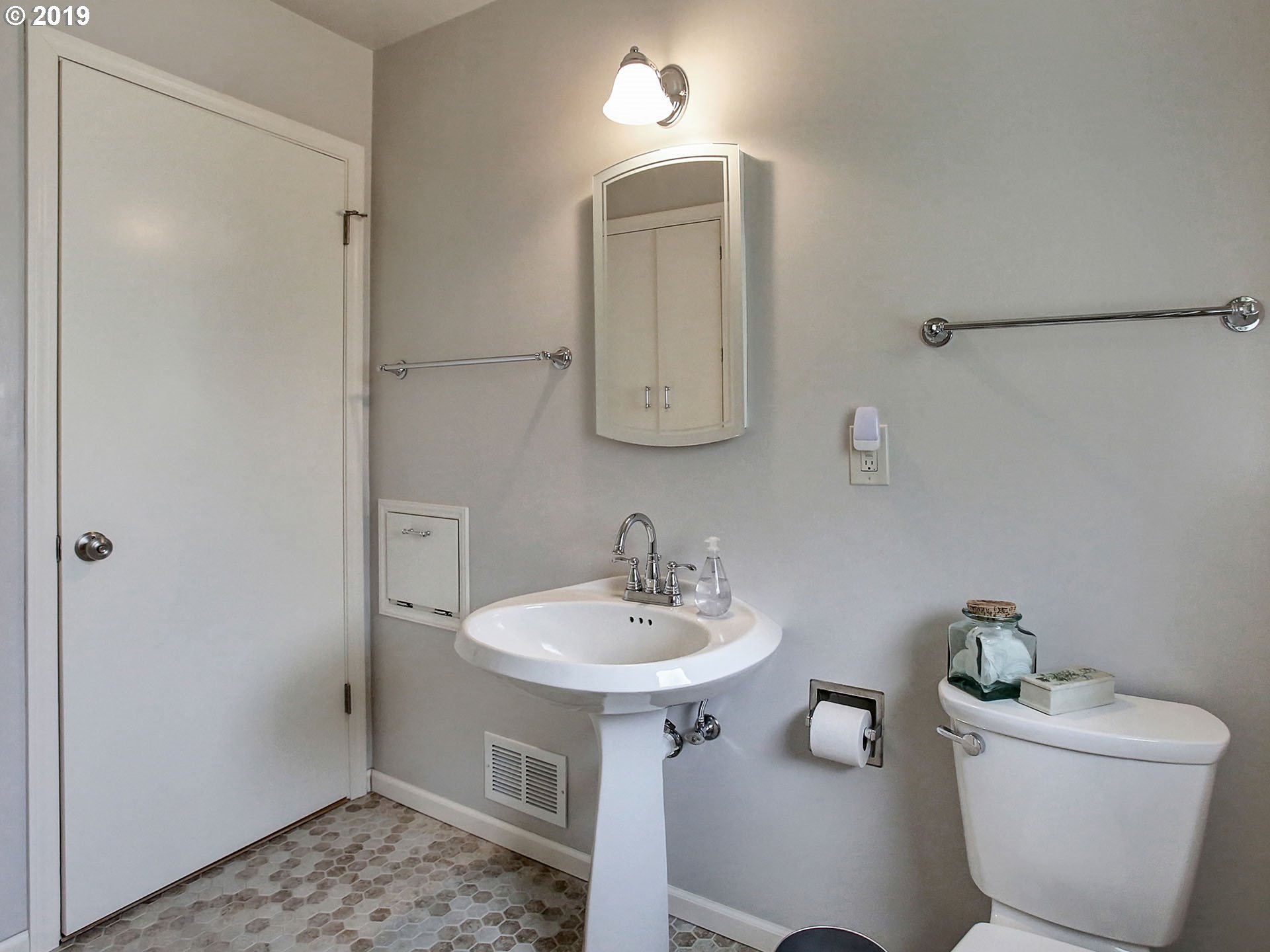4119 Southwest Hamilton Street Portland, OR 97221 - Photo 15 of 29 a bathroom with a sink toilet and mirror