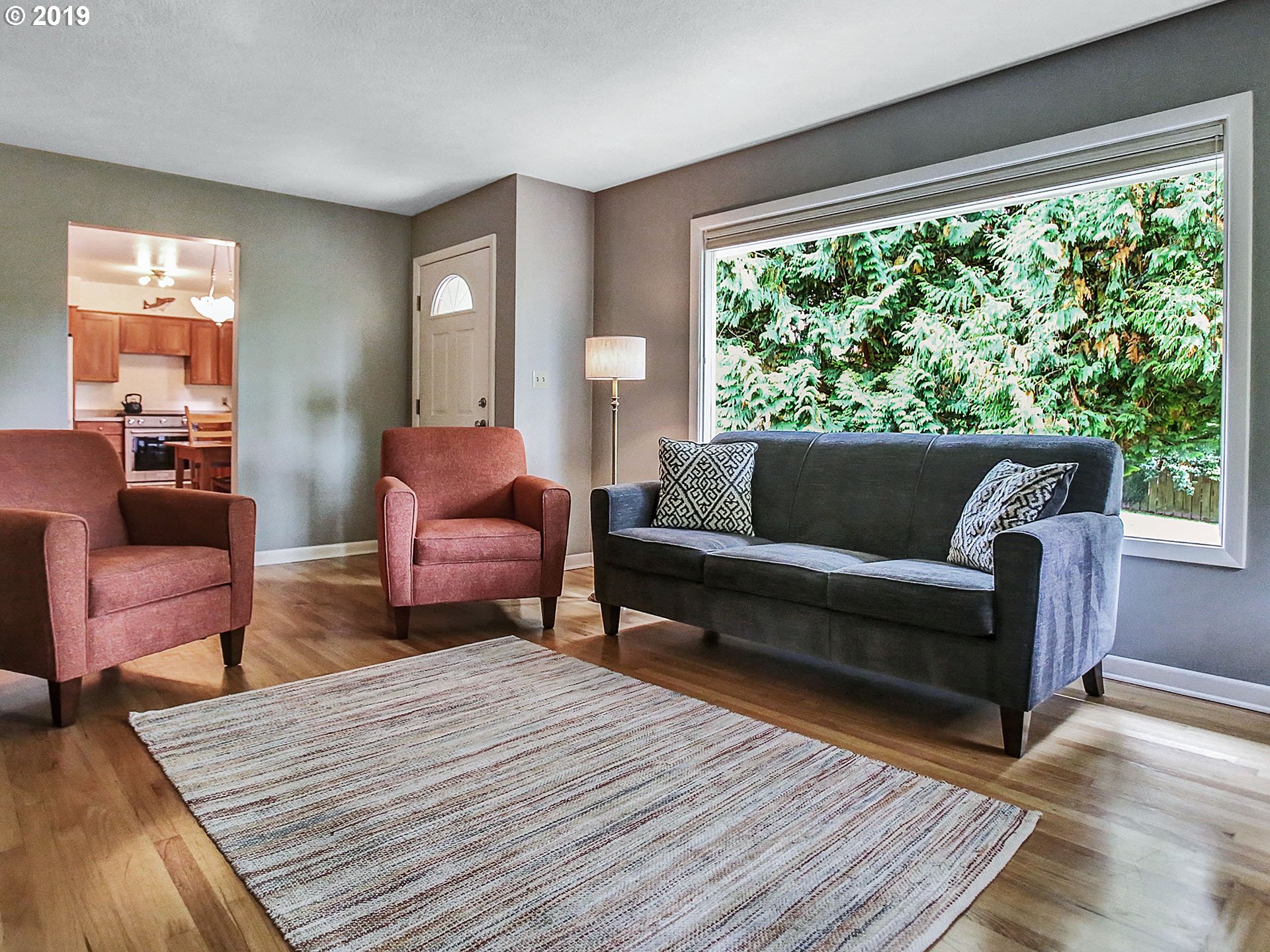 4119 Southwest Hamilton Street Portland, OR 97221 - Photo 8 of 29 a living room with furniture and a large window