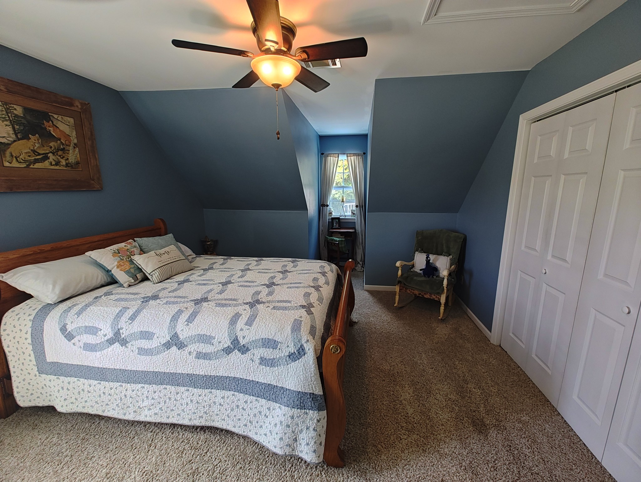 2770 Beech Log Road Watertown, TN 37184 - Photo 46 of 87 a bedroom with a bed and a chandelier