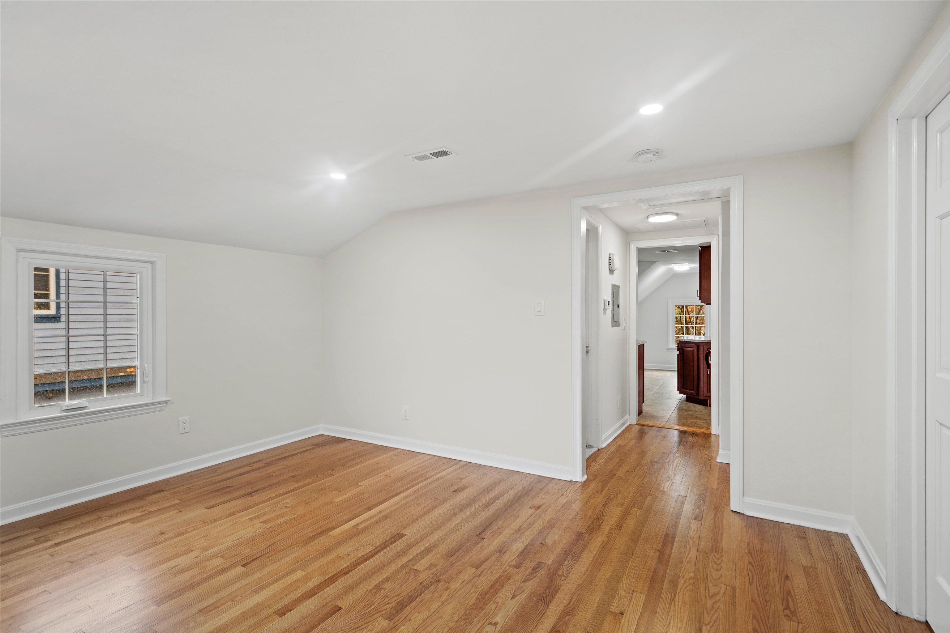 238 Springfield Avenue, Unit 2 Rutherford, NJ 07070 - Photo 12 of 21 a view of a room with wooden floor and window
