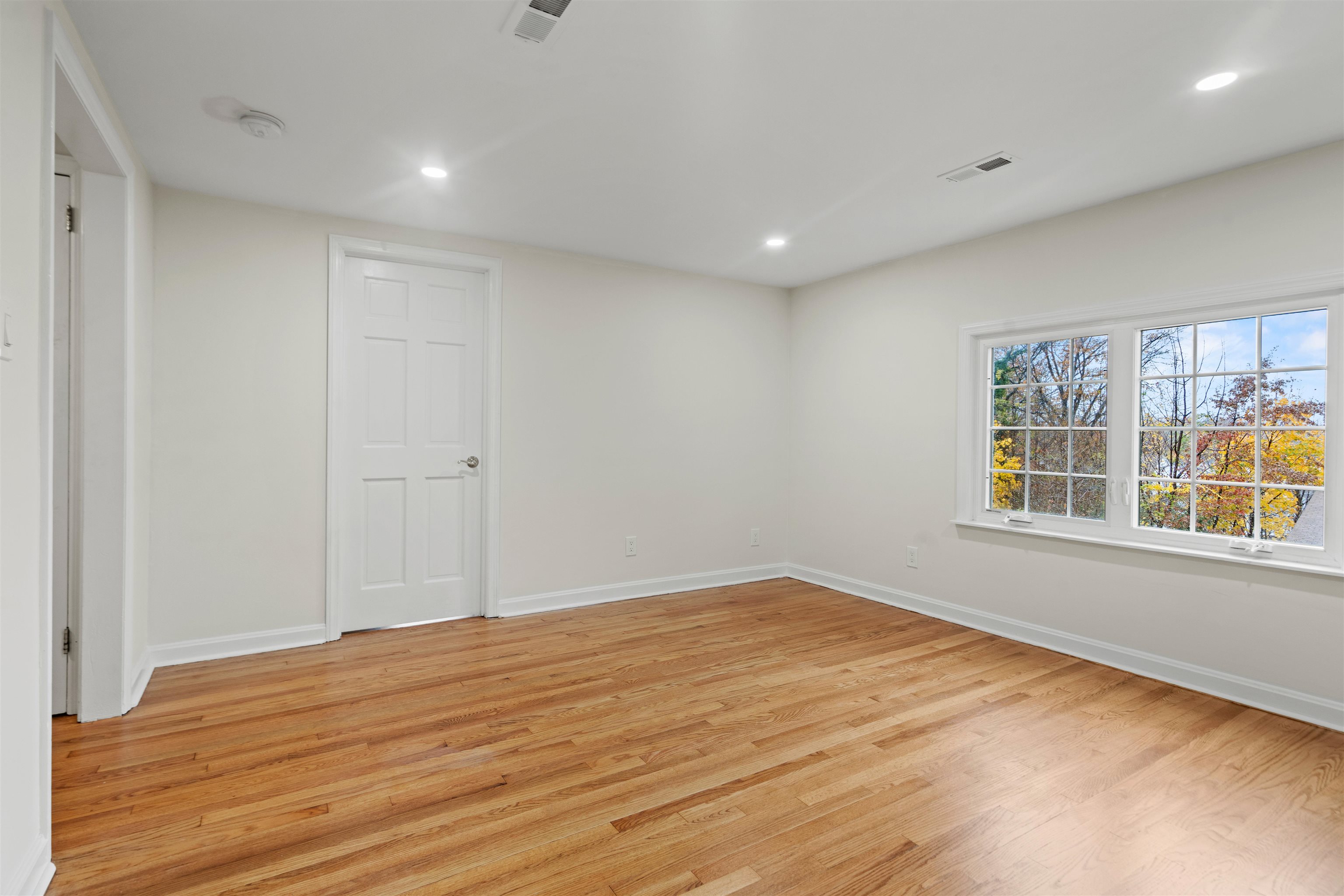238 Springfield Avenue, Unit 2 Rutherford, NJ 07070 - Photo 3 of 21 a view of empty room with windows