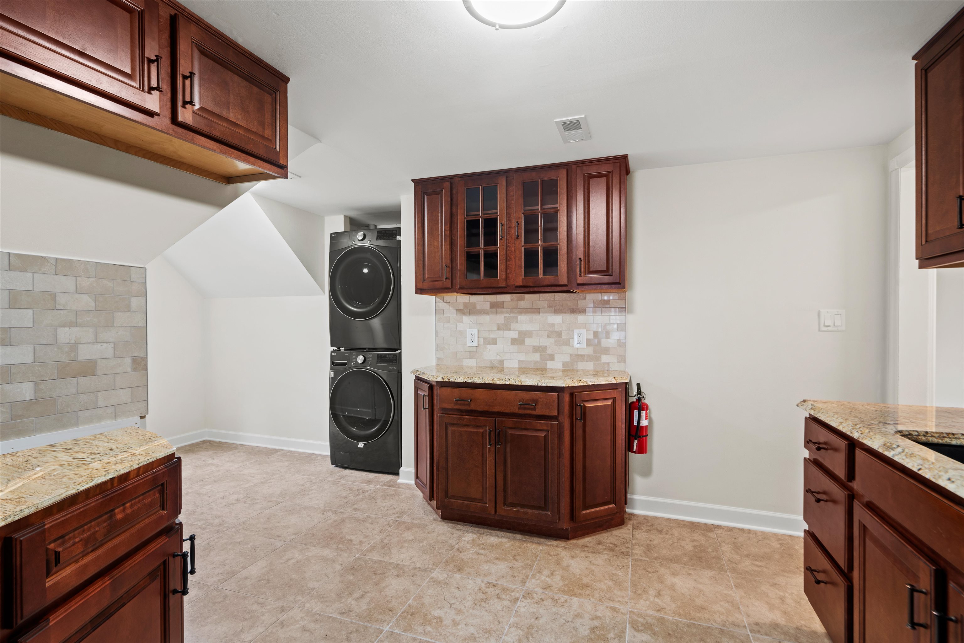 238 Springfield Avenue, Unit 2 Rutherford, NJ 07070 - Photo 8 of 21 a kitchen with stainless steel appliances granite countertop a stove and a refrigerator
