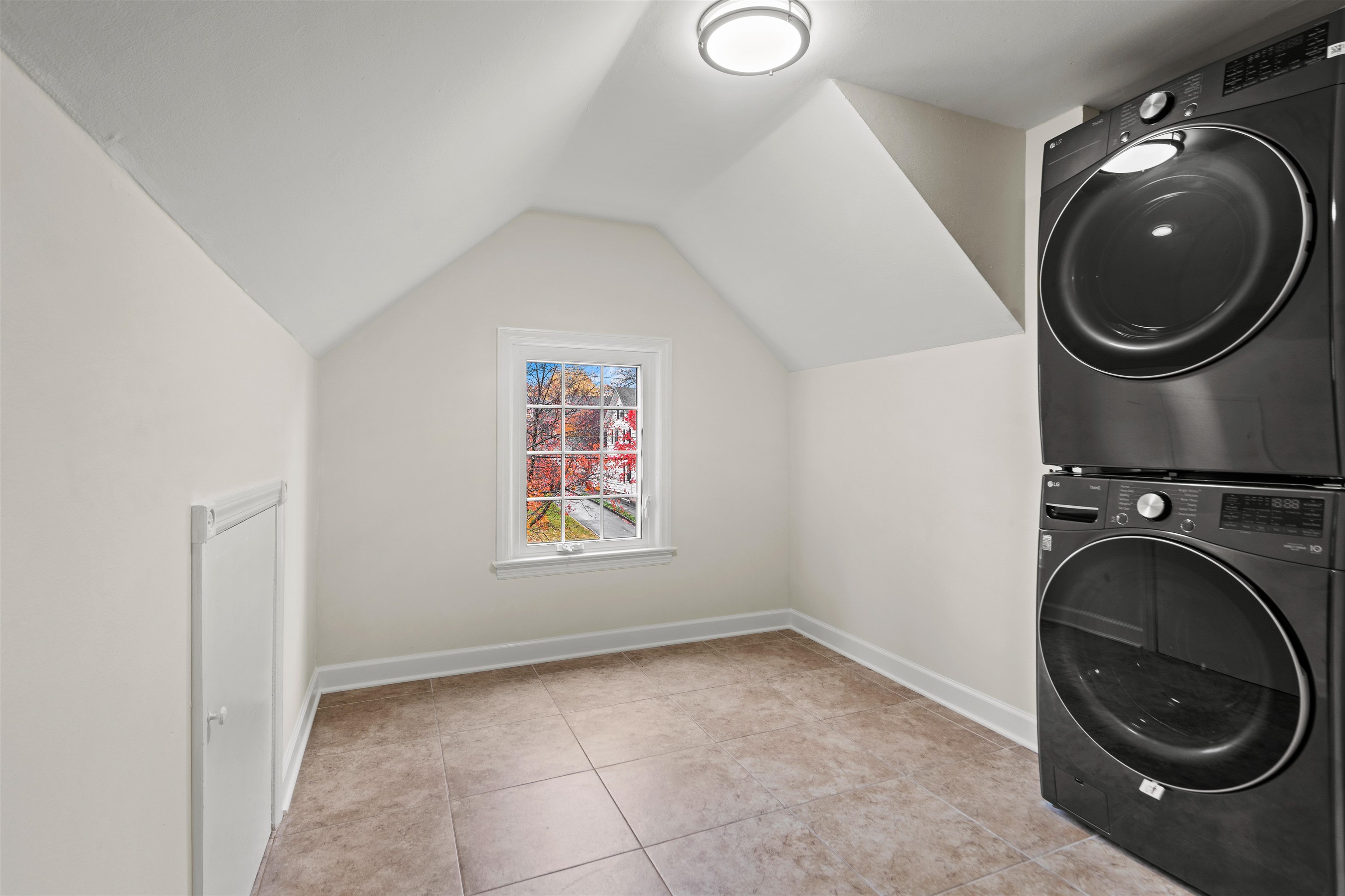 238 Springfield Avenue, Unit 2 Rutherford, NJ 07070 - Photo 9 of 21 a view of a storage & utility room with a washer and dryer